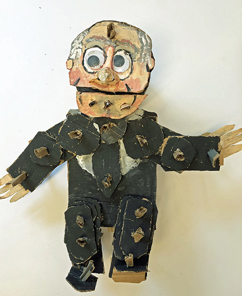 Brent Brown | BRB487 | Statler (The Muppets), 2018   | 
	 Cardboard, Mixed Media, on Canvas | 19 x 21 x 8 in. at the Outsider Folk Art Gallery