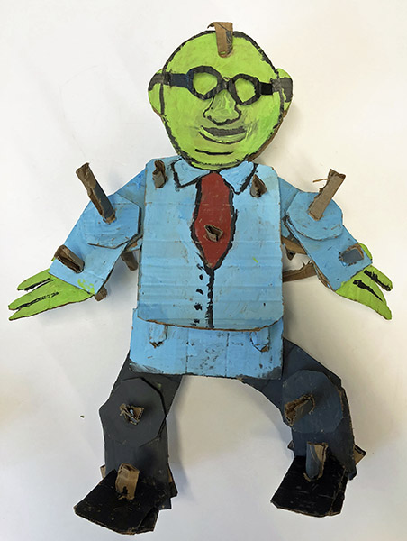 Brent Brown | BRB498 | Bunsen Honeydew (Muppet), 2018   | 
	 Cardboard, Mixed Media, on Canvas | 19 x 24 x 6 in. at the Outsider Folk Art Gallery