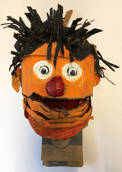 Brent Brown | BRB516 | Ernie (the Muppets), 2018  | 
	 Cardboard, Mixed Media, on Canvas | 17 x 17 x 17 in. (43.18 x 43.18 x 43.18 cm) at the Outsider Folk Art Gallery