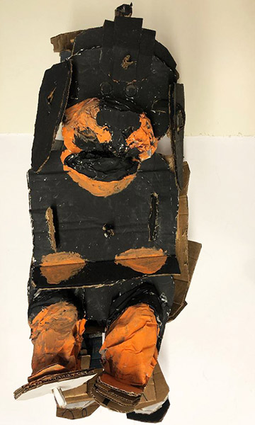 Brent Brown | BRB524 | Rottweiler, 2018 | 
	 Cardboard, Mixed Media, on Canvas | 15 x 27 x 15 in.  at the Outsider Folk Art Gallery