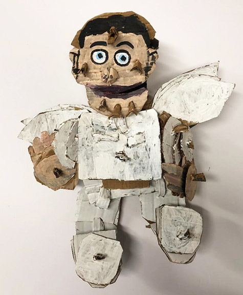 Brent Brown | BRB539 | Charles the Angel, 2018   | 
	 Cardboard, Mixed Media, on Canvas | 20 x 20 x 8 in. at the Outsider Folk Art Gallery