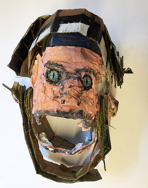 Brent Brown | BRB692 | Gregory the Puppet, 2019  | 
	 Cardboard, Mixed Media | 15 x 19 x 8 in. at the Outsider Folk Art Gallery