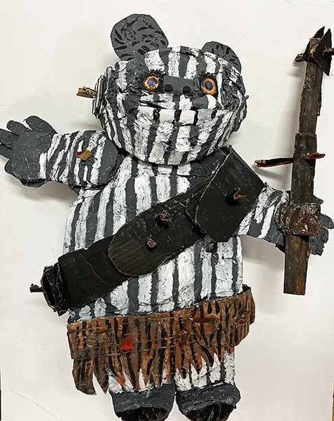 Brent Brown | BRB991 | Pox the Ewok, 2022  | 
	 Cardboard, Mixed Media | 21 x 30 x 8 in. at the Outsider Folk Art Gallery