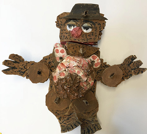 Brent Brown | BRB461 | Fozzie Bear, 2018 | 
	 Cardboard, Mixed Media, on Canvas | 20 x 23 x 4 in. at the Outsider Folk Art Gallery