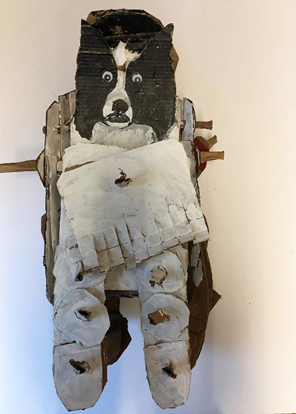 Brent Brown | BRB517 | Border Collie, 2018 | 
	 Cardboard, Mixed Media, on Canvas | 18 x 27 x 10 in.  at the Outsider Folk Art Gallery