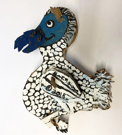 Brent Brown | BRB561 | Dodo Bird, 2019  | 
	 Cardboard, Mixed Media | 17 x 18 x 17 in.  at the Outsider Folk Art Gallery