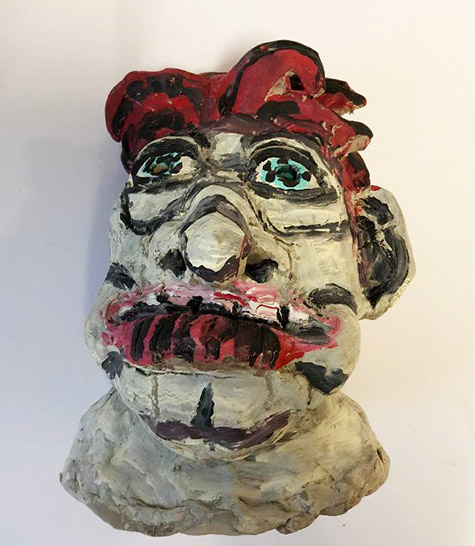 Brent Brown | BRB570 | Clown, 2017  | 
	 Painted Clay | 7 x 8 x 5 in. at the Outsider Folk Art Gallery