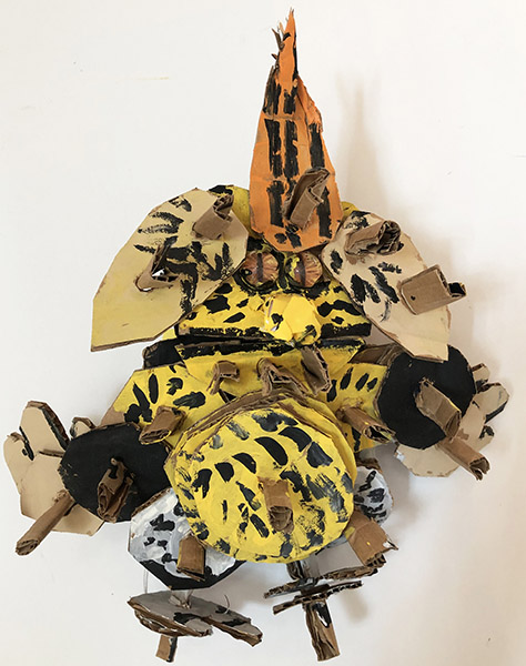 Brent Brown | BRB602 | Munchy Grem, Jr., 2019 | 
	 Cardboard, Mixed Media, 12 x 12 x 5 in.  at the Outsider Folk Art Gallery