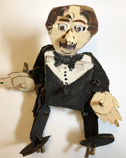 Brent Brown | BRB666 | Black Tie, 2019  | 
	 Cardboard, Mixed Media | 20 x 23 x 8 in. at the Outsider Folk Art Gallery