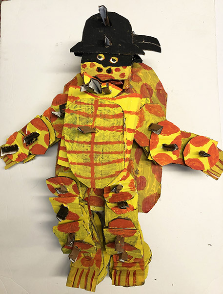 Brent Brown | BRB976 | Spec of the Derby Turtle Gang, 2021 | Cardboard, Mixed Media | 35 x 20 x 10 in. at the Outsider Folk Art Gallery