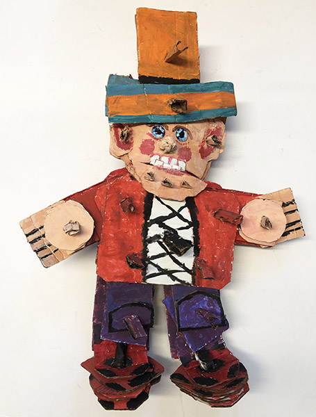 Brent Brown | BRB979 | Tyrolean Elf, 2021 | 
	 Cardboard, Mixed Media | 28 x 20 x 7 in. at the Outsider Folk Art Gallery
