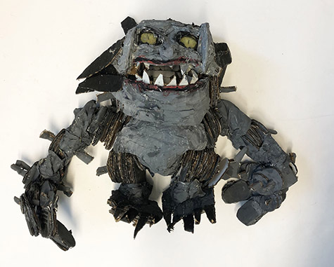 Brent Brown | BRB981 | Short Demon, 2021  | 
	 Cardboard, Mixed Media | 24 x 19 x 9 in. at the Outsider Folk Art Gallery