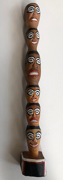William Dawson | DAW019 | Totem Pole with 6 heads, 1984 | Wood with enamel | 18 x 2 1/2 x 1 3/4 in. at the Outsider Folk Art Gallery